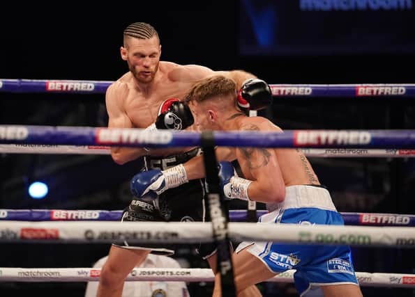 Lee Appleyard (left) does battle with Dalton Smith. Picture by : Mark Robinson and Dave Thompson/Matchroom Boxing