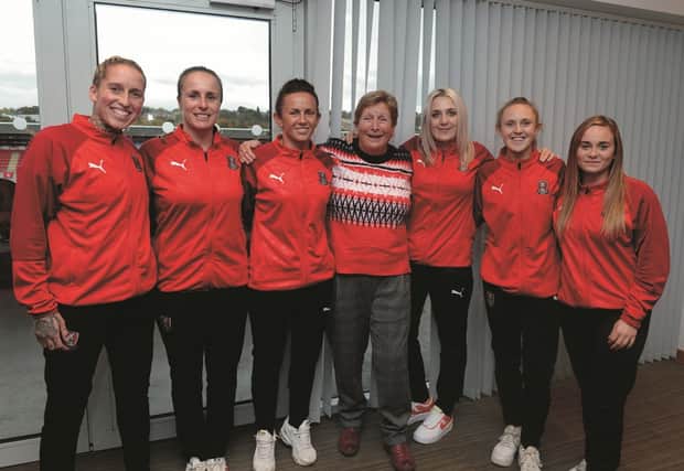A function was held at AESSEAL New York Stadium to see the live draw of the Women's Euro 2022 and mark the stadium's selection as a host venue. Rotherham United Women's stalwart Val Hoyle is pictured with Rotherham United Women players at the event.