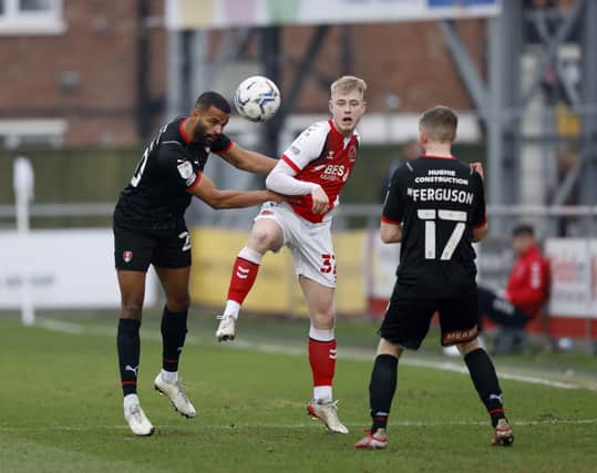 Michael Ihiekwe and Shane Ferguson in action at Fleetwood. Picture by Jim Brailsford