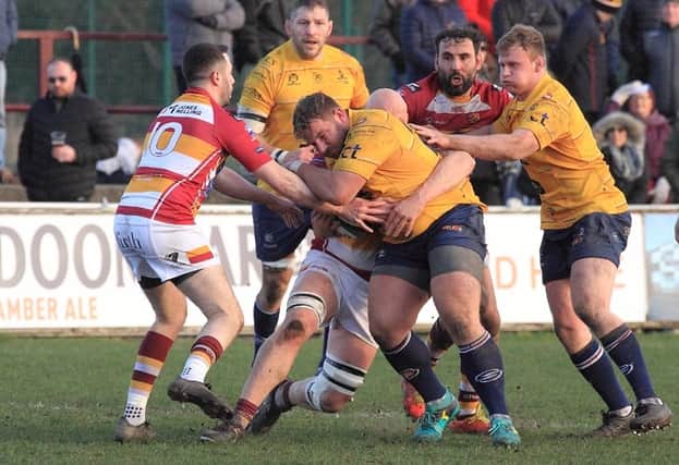 Rotherham Titans' Rikki Stout drives on in Saturday's clash at Fylde. Picture by Gareth Siddons