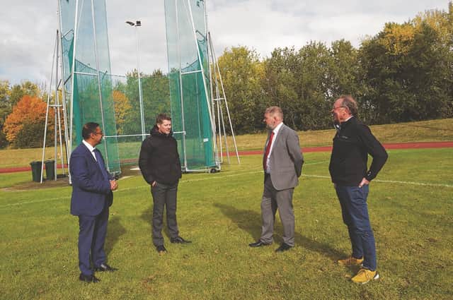 Herringthorpe Stadium Refurb-Head of Sports and Leisure and Strategic Partnership, Chris Siddall (2nd left) shows Cllrs Sagir Alam and David Sheppard along with Rotherham Harriers secretary, Steve Gaines around the new improvements to the stadium. 220896-2