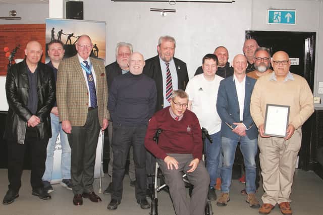 At the Men Actually Talking Together presentation at Rotherham Rugby Club are (from left) Matthew Gulliver, Wayne Martin, LtCol Mac McPherson (High Sheriff of South Yorkshire), Phil Payne, Rob Walker, Tony Clabby, Andrew Wood, Nic Widdison, Danny Hammerton, Simon Davies, Big Rob, Cllr Michael Sylvester and Martin Gabriel. Picture by GARETH SIDDONS