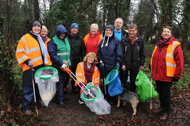 Seen in local woodland in North Anston are local councillors and residents who recently took part in a community litter pick. Organisers are (far right) Cllr Judy Dalton and (kneeling) Cllr Jo Buurton, who had help from the Rother Valley South Area Assembly by provinding tools and safety equipment for the clear up. 140085-1