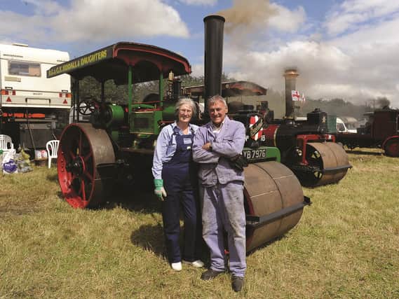 Seen with their steamroller 'Toby' are Bob and Gill Siddall. 171081-10