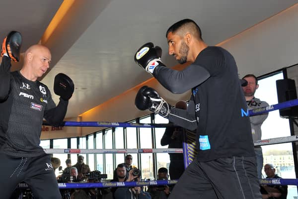 Atif Shafiq in the ring with trainer Dominic Ingle at the Crucible. Pic: DAVE POUCHER