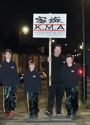 Carl Taft and his children who walk to Kazoku Martial Arts from their Canklow home. From left to right are: Jason, Luke and Owen Taft.