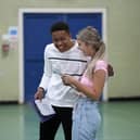 Asher Greatorex and Katie Wright celebrate picking up their GCSE results. PICS: Alex Roebuck.