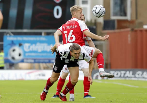 Jamie Lindsay fights for possession at Blundell Park. Picture by Jim Brailsford