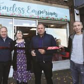Manager of the new Rotherham Hospice Shop, 'Timeless Emporium' at Wickersley, Julie Dalton (centre), along with TV personality Dean Andrews and Rotherham's very own John Breckin who performed the opening on Monday. Also pictured are hospice staff, Stephen Marson and Dawn West. 220909-3