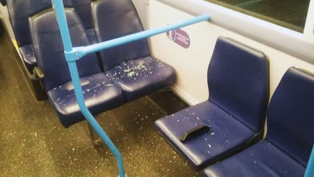 Seats were left covered in broken glass by the attack