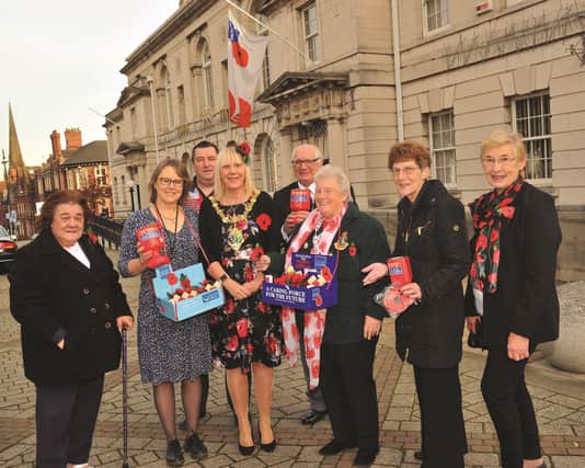 The Mayor of Rotherham, Cllr Eve Rose Keenan along with volunteers and supporters who launched this years Rotherham Poppy Appeal at Town Hall on Monday. Pictured (from left to right) is, Sylvia Hull, Christine Bradley, Cllr Ian Jones, armed forces champion, appeal co-ordinator, Ron Moffett MBE, Sally Moffett, Cllr Rose McNeeley and Linda Bishop. 171860-2
