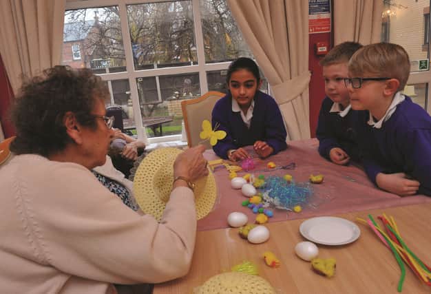 Youngsters from Herringthorpe Junior School visited residents at Clifton Meadows Care Home last Friday to help make some Easter Bonnets. Pictured are residents, Coleen Baxter (left) and Rita McDermott with children (from left to right), Isha Hussain, Jack Ridsdale and Liam Webb. 180404-1