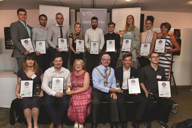 Finalists and winners of the Rotherham Apprentice of the Year Awards pictured with the Mayor and Mayoress of Rotherham Cllr Alan and Mrs Sandra Buckley. Pictured are (left to right) back row: finalists: Tom Honeyball (Liberty Steels), Cameron Starkey (MGB Plastics), Daniel Harrison (Mears Group), Chloe Poole (Premium Beverages), Ashley Walker (Horbury), James Colquhoun (Taylor Bracewell), Samantha Horton (NHS), Ellie Matthews (Bluebell Wood) and Celia Troop (NHS); front row: winners Gwenan Durn (NHS), Ryan Morris (AESSEAL), Nathan Wall (AESSEAL) and Michael Michalweicz (XPO). 183933-01