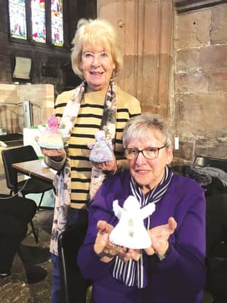 Jenny Claxton and Lillian Schofield with their knitted angels at Tuesday’s workshop