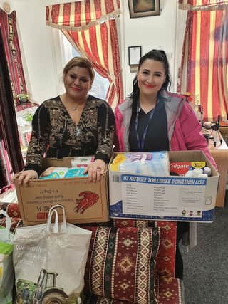 Tess Wootton (right) with charity organiser Shaha Salha.