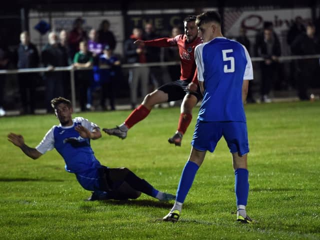 Action from last night's game between Swallownest and Parkgate. Picture by DAVE POUCHER