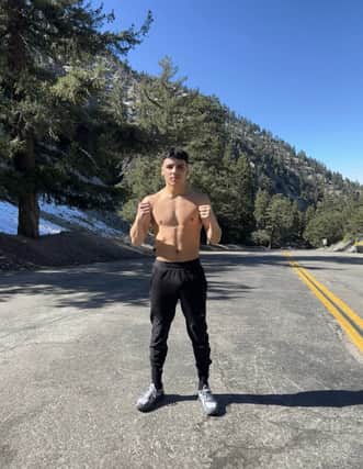 In training ... boxer Junaid Bostan on a mountain run in the States.