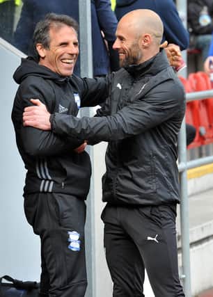 Paul Warne greets Blues boss Gianfranco Zola before kick-off.