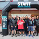 Ronnie Moore, Jeff Stelling, Chris Kamara and Paul Jewell, pictured front row (left to right), with the rest of the team who completed the walk at Barnsley’s Oakwell stadium .