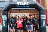 Ronnie Moore, Jeff Stelling, Chris Kamara and Paul Jewell, pictured front row (left to right), with the rest of the team who completed the walk at Barnsley’s Oakwell stadium .