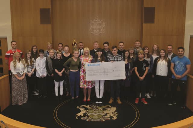 NCS youngsters are seen handing over the cheque to the Mayor of Rotherham Cllr Eve Rose Keenan during their recent visit to the Town Hall.171490