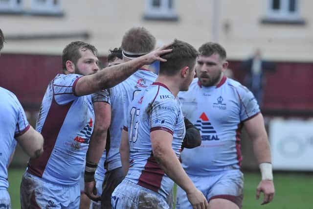 Harry Dunne Rugby Two-try Titans man salutes team-mates