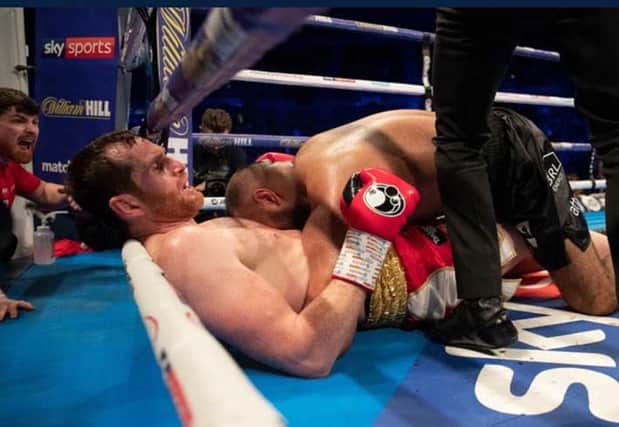 An injured David Price protests during the flashpoint of Saturday's fight with Kash Ali.