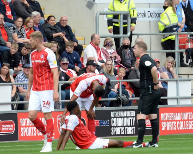 Chiedozie Ogbene goes down injured against Sheffield Wednesday. Picture by Dave Poucher
