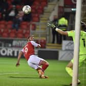 Will Grigg scores. Picture by Dave Poucher