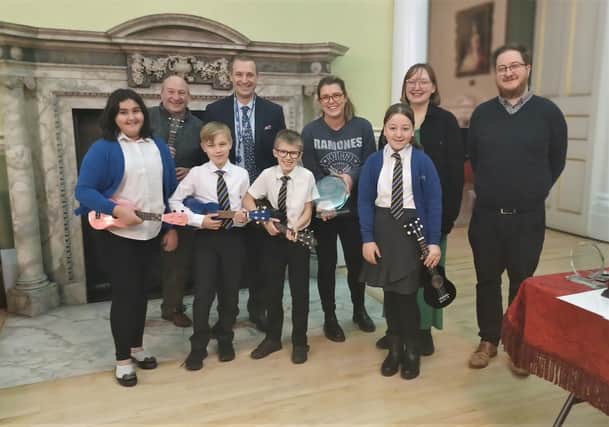 The winning students with Brett Smith from Doncaster Music Service, David Longley, head of Montagu Academy), Cllr Lani-Mae Ball, teaching assistant Amy Khaira and Carl Wragg of Doncaster Music Service.