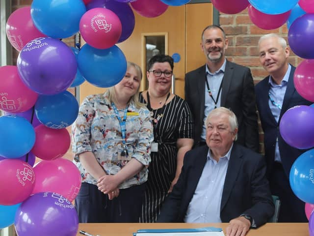 Vicky Wilkinson, Sam Longley, Ben Anderson, Michael Wright and Cllr David Roche sign the pledge to become a breastfeeding friendly borough