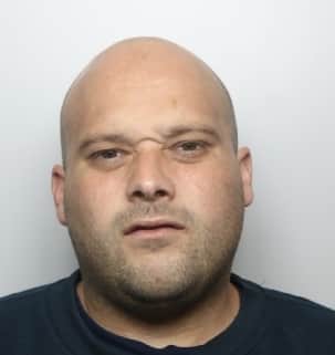 Burglar jailed for almost three years