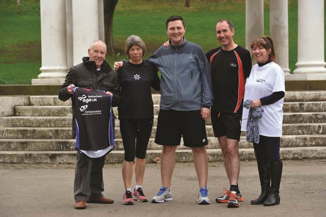 (Pictured from left to right), Ray Matthews, Wendy Whitaker, Rotherham Harriers, Sam Cooper and Andrew Mosley, Rotherham, Advertiser and Julie Benson, fundraising co-ordinator for Age UK Rotherham. 170397-1