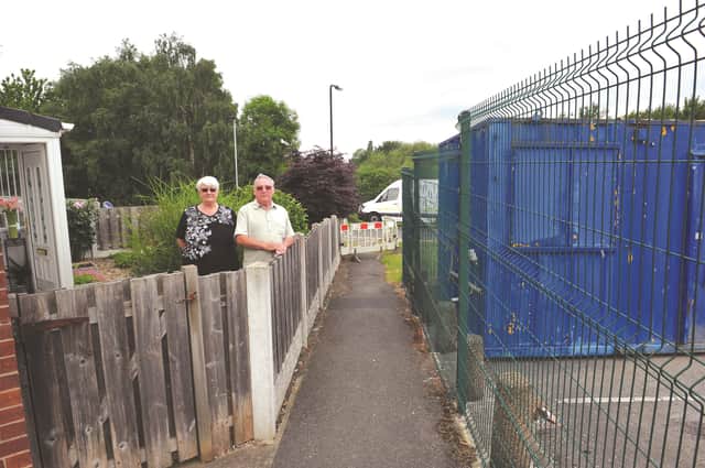 Fred and Susan Scholey from Valley Drive in Wath who have had their view from the front garden obscured by a huge conatainer which is to used for a new car wash business. 170918-1
