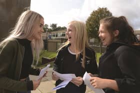 Rawmarsh Community School students open their GCSE results. From left to right are: Chloe Haigh, Charlotte Rockley and Yazmin Thomson. 171455-2
