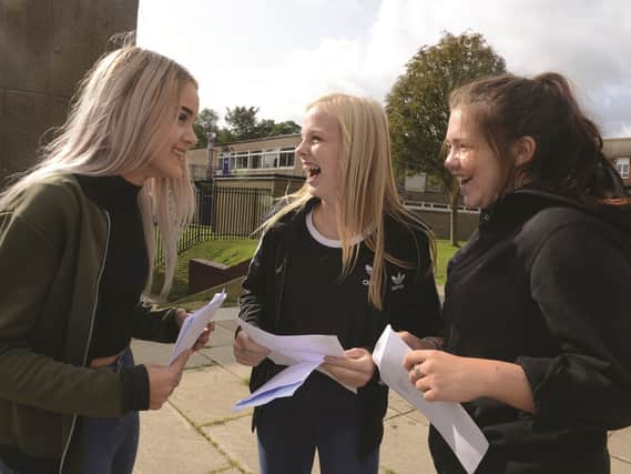 Rawmarsh Community School students open their GCSE results. From left to right are: Chloe Haigh, Charlotte Rockley and Yazmin Thomson. 171455-2