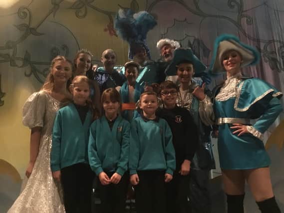 Members of the cast with pupils Angel Hall, Darja Dolgova, Levi Goddard and Jack Squires