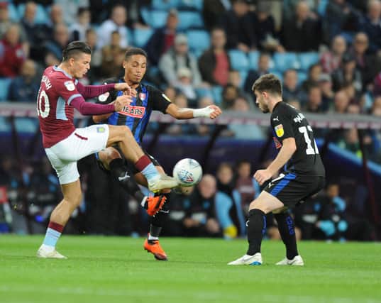 Zak Vyner and Ryan Manning scrap it out in Tuesday's defeat at Aston Villa.