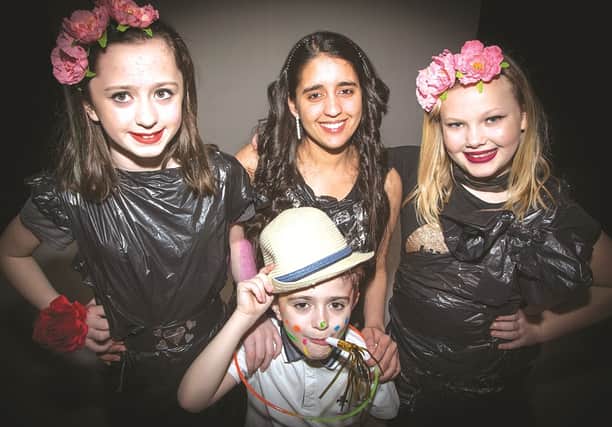 Members of the Rotherham Looked-After Children’s Council taking part in their Bin Liners are Not Suitcases fashion show.