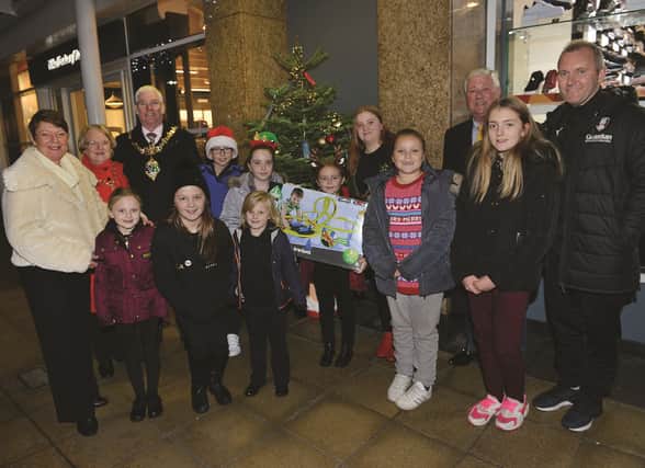 The Christmas Toy appeal launched by the Mayor and Mayoress of Rotherham, Cllr Alan and Mrs Sandra Buckley, Parkgate centre manager Janet Drury, Rotherham United chairman Tony Stewart and coach Matt Hamshaw.