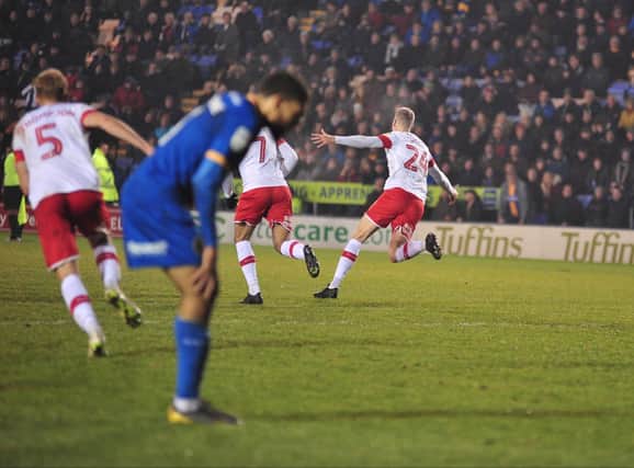 Michael Smith celebrates his last-gasp winner. Pictures by Trevor Price