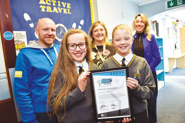 Listerdale Junior Academy has just been awarded the prestigious Modeshift STARS Platinum Award for Active Travel to School. Receiving the award on behalf of the school are Junior Road Safety Officers, Hope Bonnington and Myla Parker with Chris Pryor, Modeshift STARS Officer, Helen Hodges, assistant vice principal and Emily Sykes, Modeshift STARS Active Travel Officer for Rotherham looking on