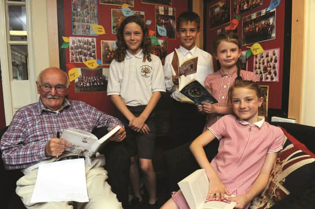 Wallace Hible (89) with pupils (L-R), Lawrence, Austin, Abbie and Millie.