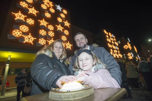 L-R Kirsta, Kendra and Kevin Theaker-Gregersen, who pressed the switch-on button. Kendra has toured the country attending comic-con events showcasing her Lego sets, raising £2,500 for the hospital so far