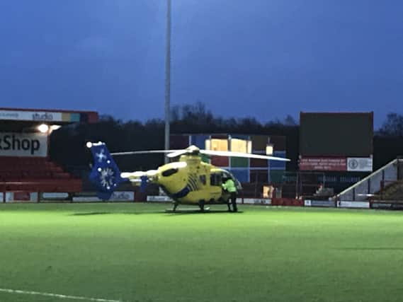 The air ambulance on the pitch at Accrington's Wham Stadium on Saturday.