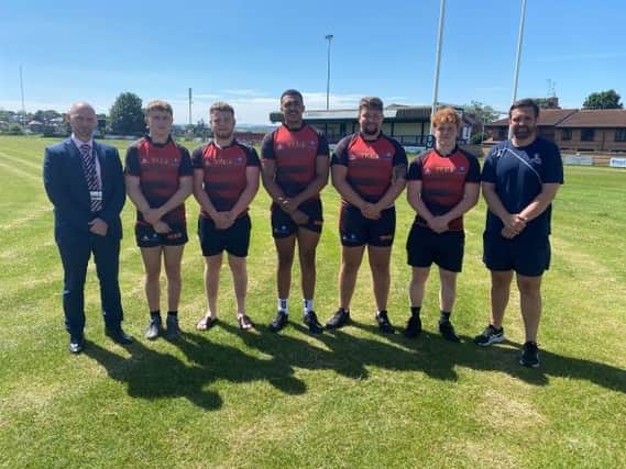 PASSION FOR RUGBY... (left to right) Chris Walls, assistant principal at Thomas Rotherham College, Rugby Academy students Vinny Walls, Jak Mercer, Lincoln Venture, Jack Wrigley and Olly Winstanley and Rotherham Titans head coach Steve Salvin.