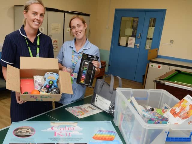 Pictured with the calm kits at the Children's Ward at Rotherham General Hospital are play specialist Katie Banks (right) and ward manager Levi Swain.