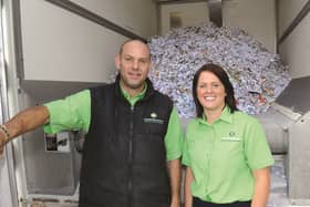 Seen with the shredded waste are Bryan Cupitt and Emma Moorhouse. 171573-4
