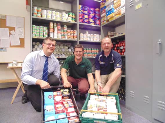 Rotherham Round Table vice-chairman Matthew Ridsdale, Steve Prosser of Rotherham Foodbank and Tim Mulroy, president of Rotherham Round Table.