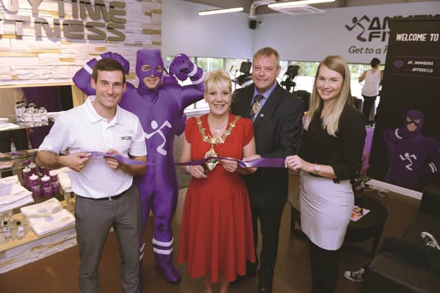 Adam White (left) and group marketing manager Laura Manley at the gym’s official opening with The Mayor of Rotherham Cllr Eve Rose Keenan, her Consort Pat Keenan and the gym’s mascot Running Man. 171393